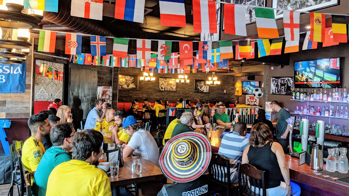 Guests watching the game at The Lobby Kitchen & Bar
